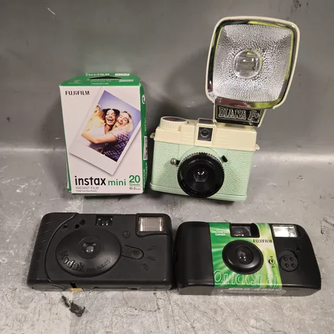 APPROXIMATELY 10 ASSORTED CAMERA PRODUCTS & ACCESSORIES TO INCLUDE DIGITAL CAMERA, INSTANT FILM, DISPOSABLE CAMERA ETC 
