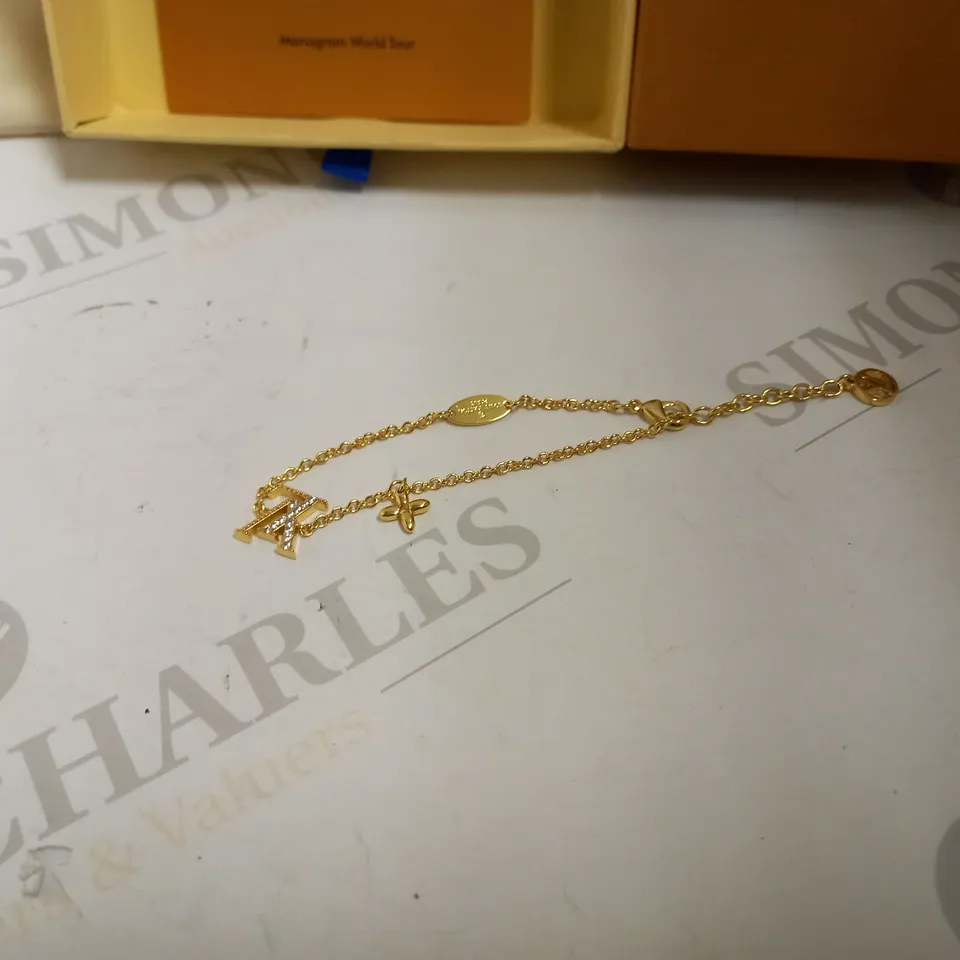 LOUIS VUITTON GOLD PLATED BRACLET