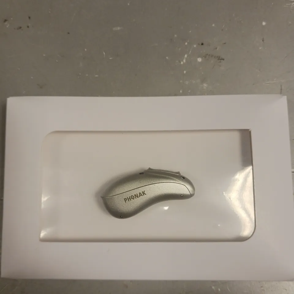 BOXED PHONAK AUDIO L-RL HEARING AID & CHARGING CASE 