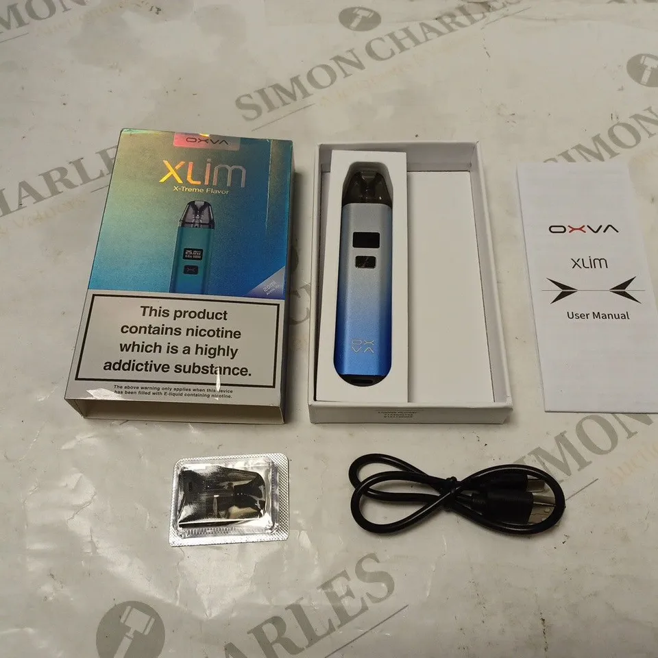 BOXED OXVA XLIM X-TREME FLAVOR VAPE KIT WITH MANUAL AND USB CABLE