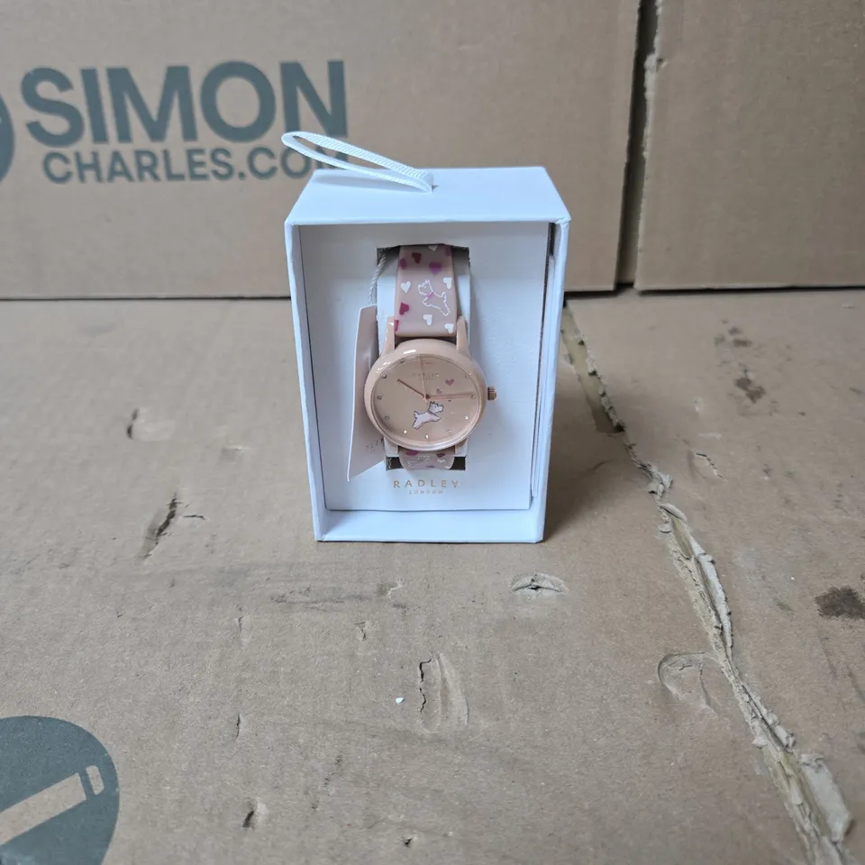 RADLEY LONDON PINK WRISTWATCH WITH DOG DESIGN. BOXED