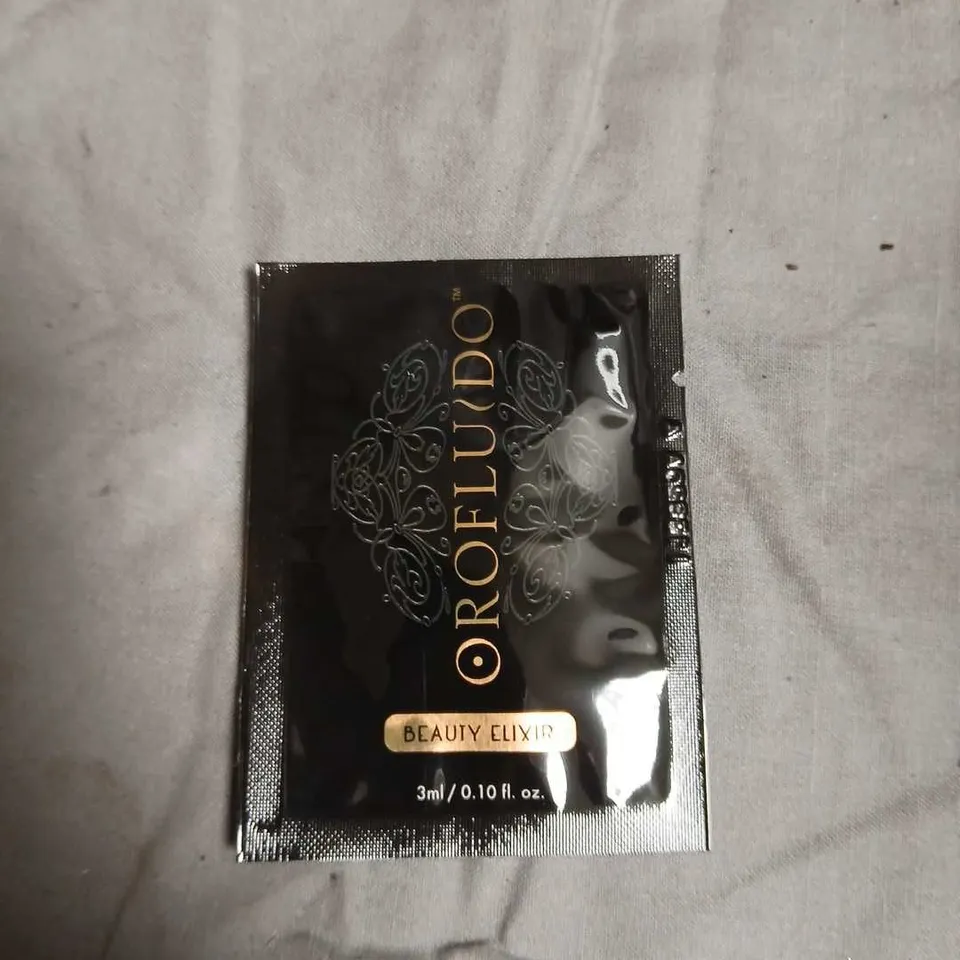 BOX OF APPROXIMATELY 250 OROFLUIDO BEAUTY ELIXIR HAIR OIL – SACHET PACK-NO EXPIRY DATE SHOWN 