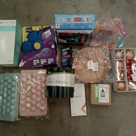 PALLET OF ASSORTED ITEMS INCLUDING FISH TYPE PROTECTIVE MASKS, FLAT BALL DISC, CHRISTMAS BAUBLE SET, LAWN EDGING, ICE CUBE MOLDS, TEETH WHITENING STRIPES