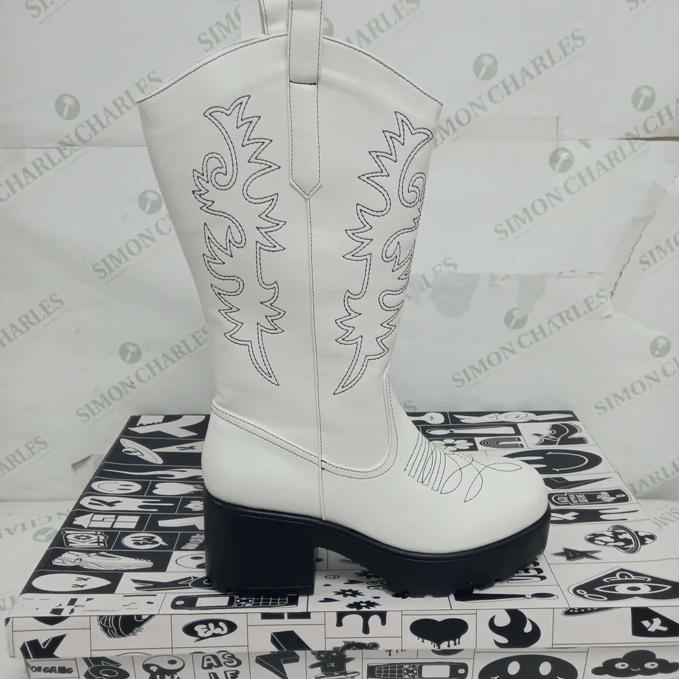 BOXED PAIR OF KOI FOOTWEAR WINTU LONG CHUNKY WESTERN BOOTS IN WHITE - SIZE 7