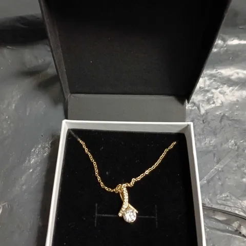 GOLD-TONE PENDANT NECKLACE WITH CLEAR STONES