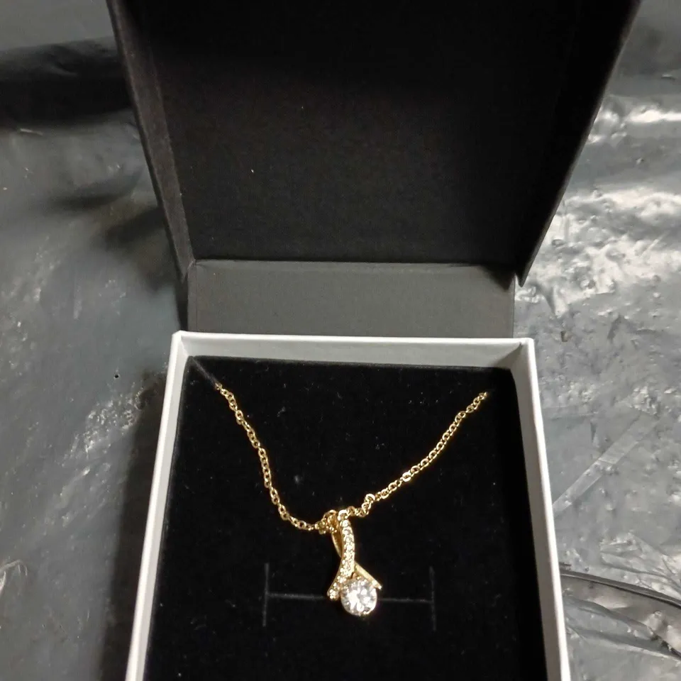 GOLD-TONE PENDANT NECKLACE WITH CLEAR STONES