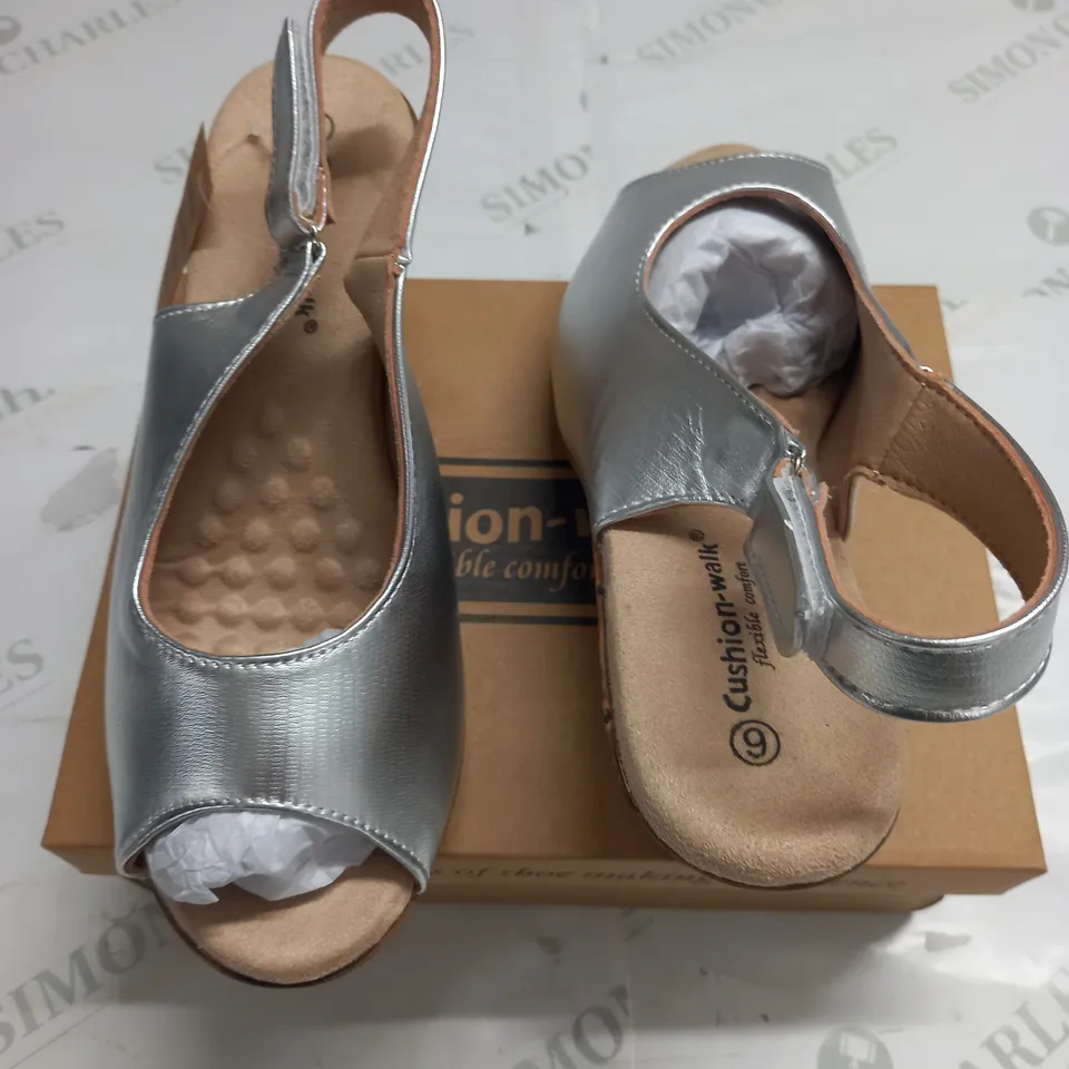 BOXED PAIR OF CUSHION WALK SILVER STRAPPY WEDGE HEELED SHOES - SIZE 6