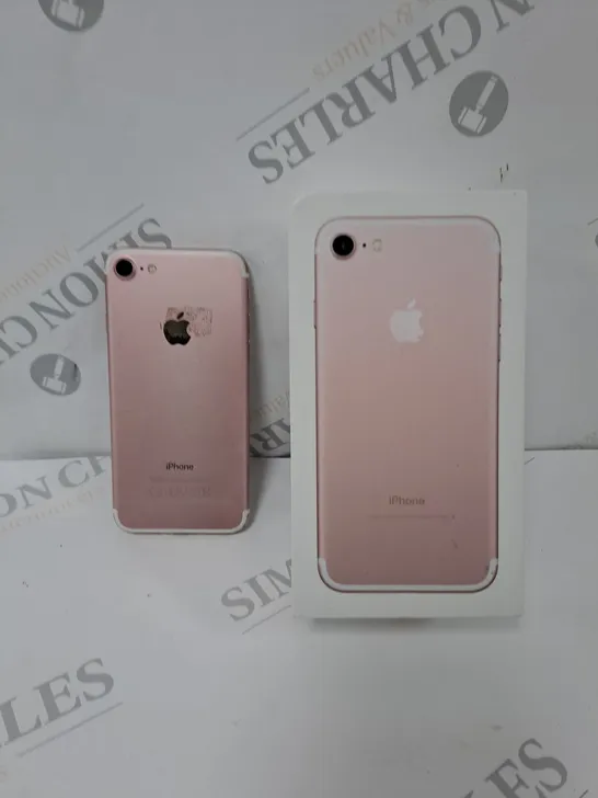 Lot 1287 BOX APPLE IPHONE 7 IN PINK 4602494 Simon Charles Auctioneers