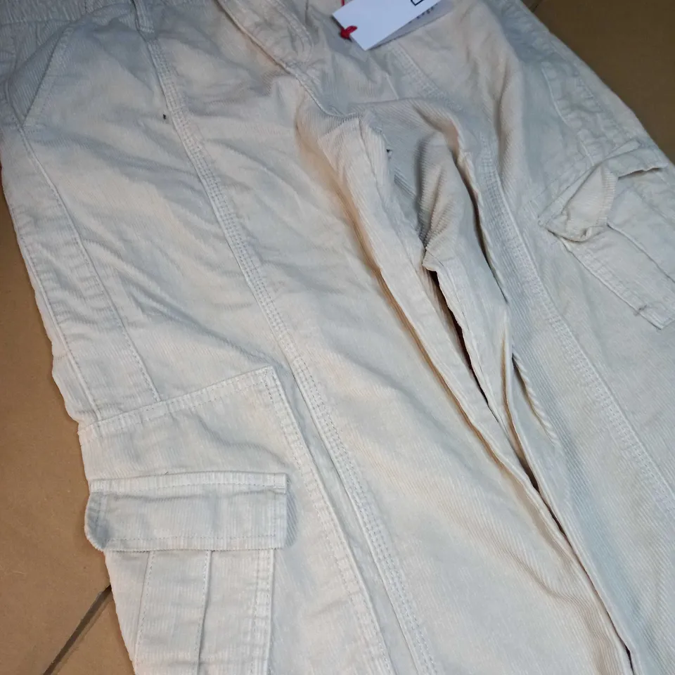 BDG URBAN OUTFITTERS CREAM LOW RISE CORD UTILITY TROUSERS - SMALL