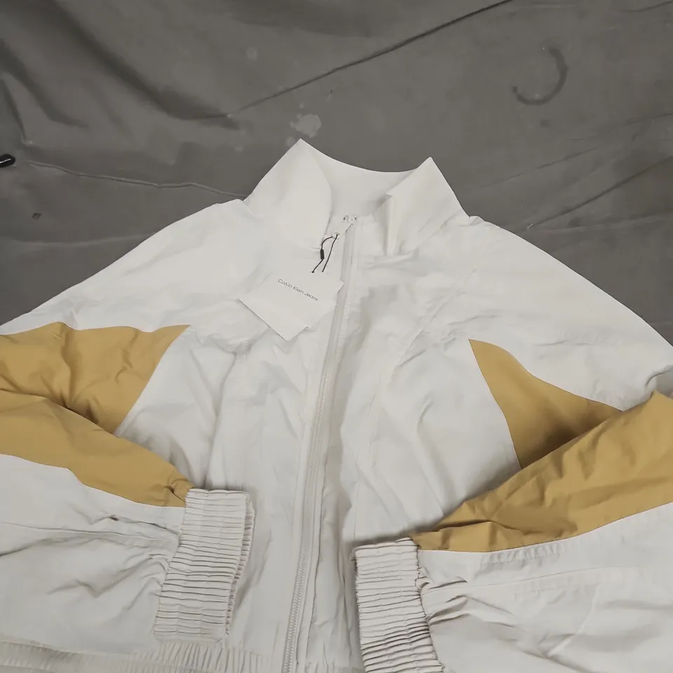 CALVIN KLEIN CROPPED COLOUR BLOCK NYLON JACKET - M