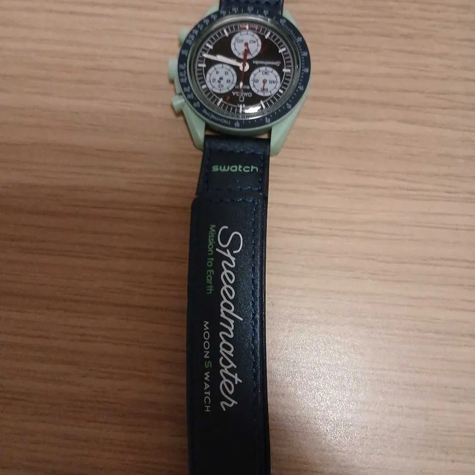 SWATCH MOONSWATCH MISSION TO EARTH WATCH – GREEN CASE, BLACK STRAP