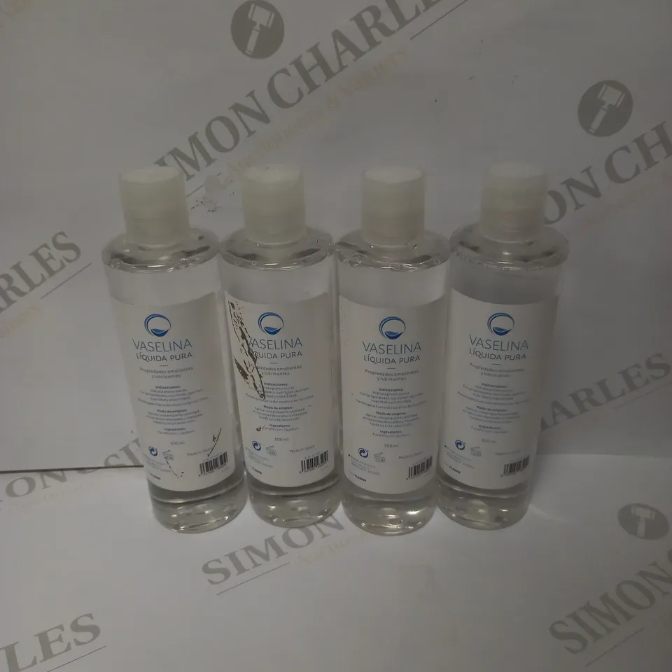 LOT OF 4 PURE LIQUID VASELINE - (4X300ML)