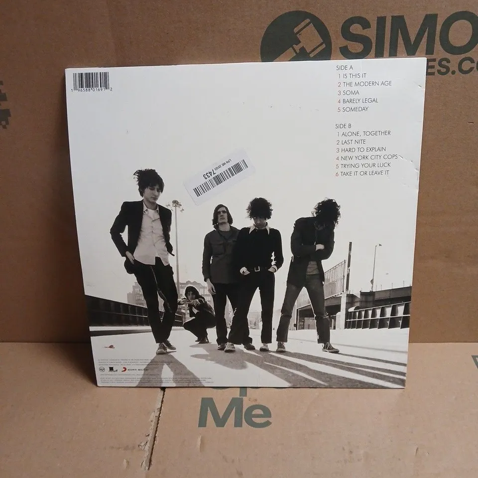 THE STROKES IS THIS IT RED VINYL LP