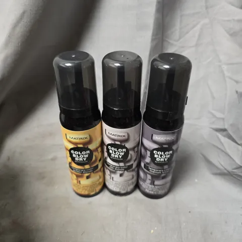 APPROXIMATELY 20 ASSORTED MATRIX BLOW DRY SPRAYS TO INCLUDE ASH BLONDE, TITANIUM SILVER, GOLDEN BLONDE, ETC - COLLECTION ONLY