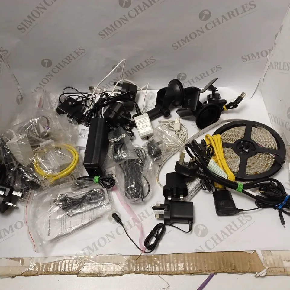 LARGE BOX OF ASSORTED WIRES AND PLUGS TO INCLUDE LAPTOP, PHONE, AND TABLET PLUGS