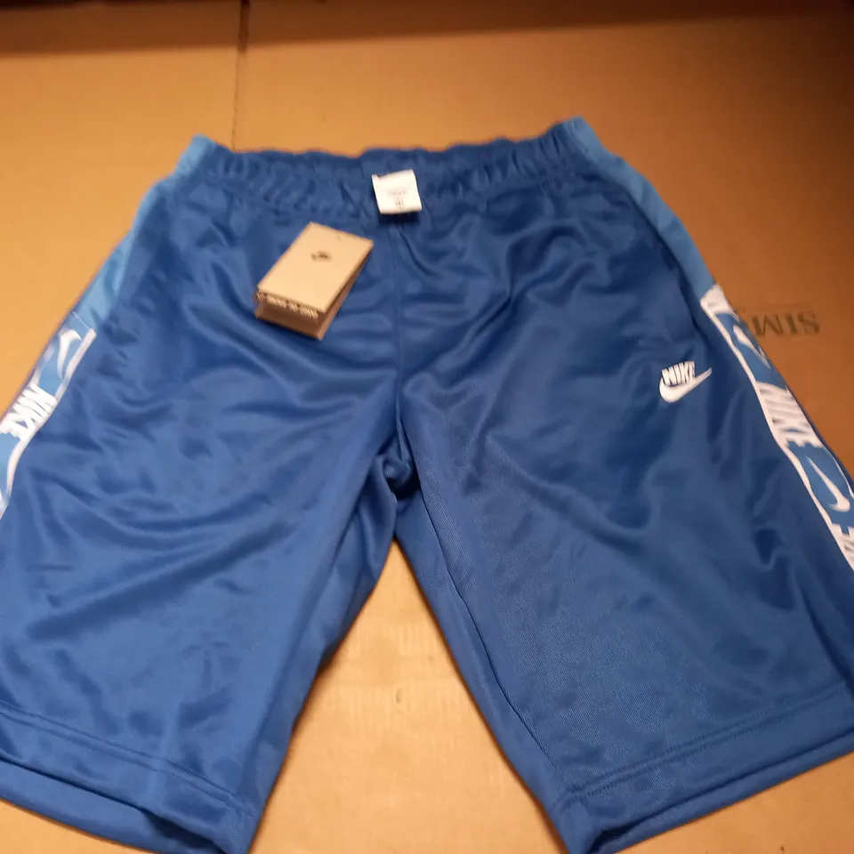 NIKE STANDARD FIT TAPE SHORTS IN BLUE - S