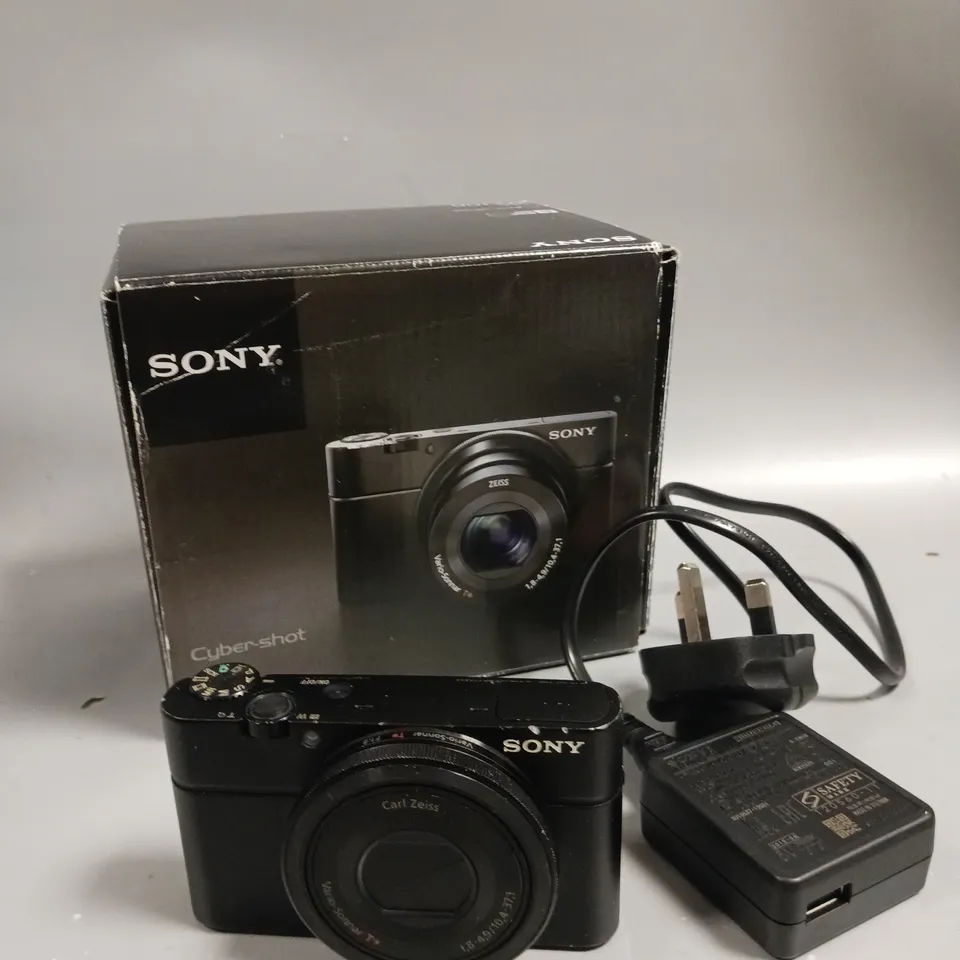 BOXED SONY DSC-RX100 DIGITAL CAMERA 