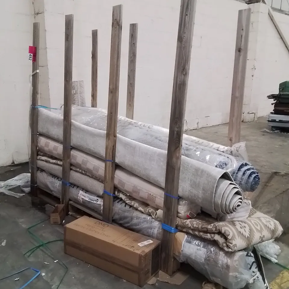 STILLAGE OF APPROXIMATELY 15 QUALITY DESIGNER RUGS XL