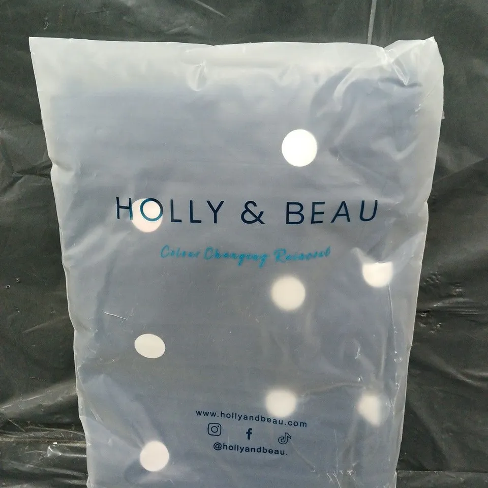 BAGGED HOLLY AND BEAU SPOT RAINCOAT - SIZE LARGE 