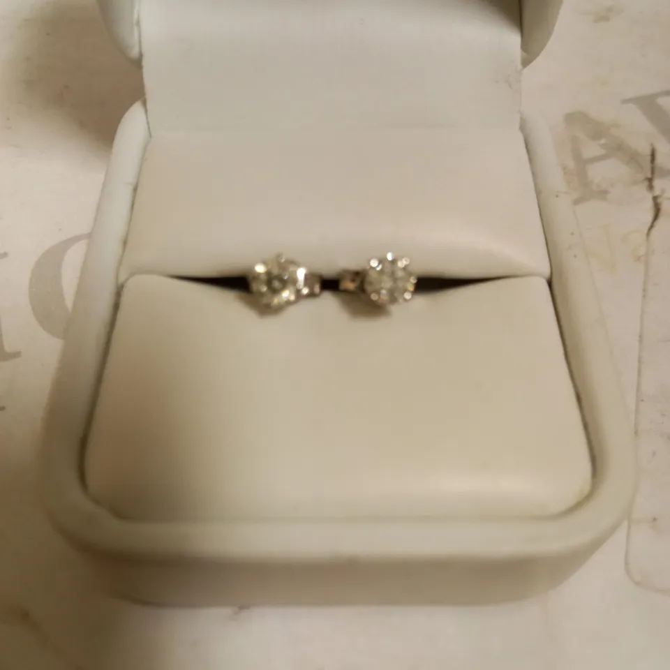18CT WHITE GOLD STUD EARRINGS SET WITH DIAMONDS WEIGHING +0.65CT