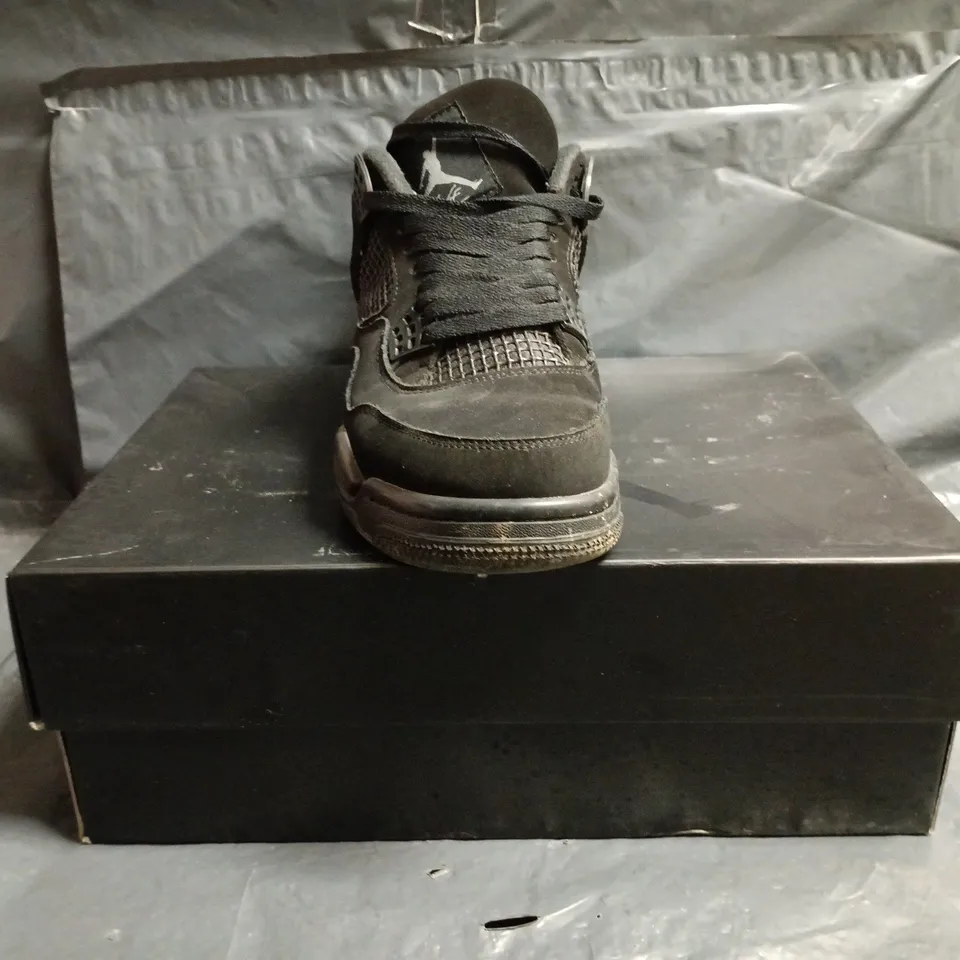 BOXED PAIR OF NIKE AIR JORDAN 4 RETRO SHOES IN BLACK SIZE UK 7
