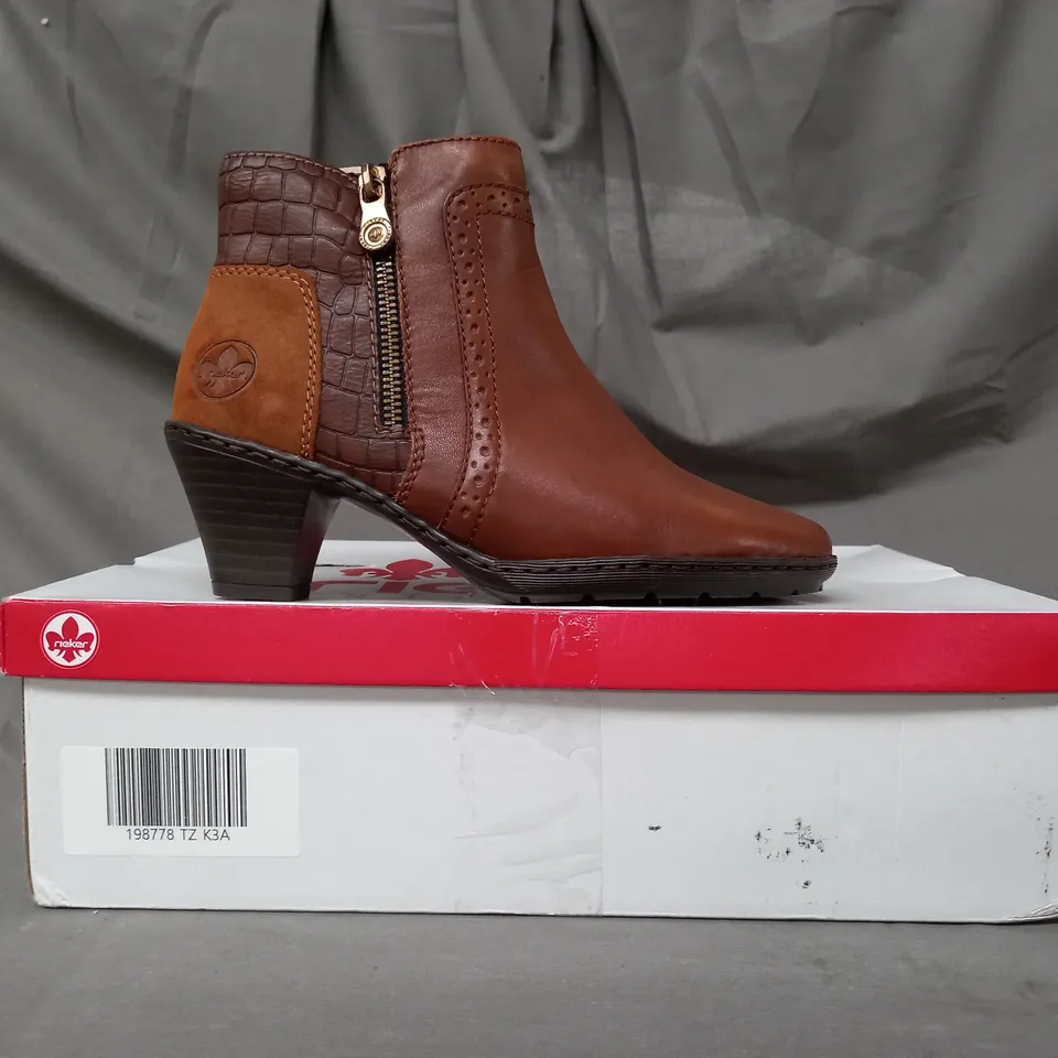 BOXED PAIR OF RIEKER BOOTS IN TAN SIZE 3.5