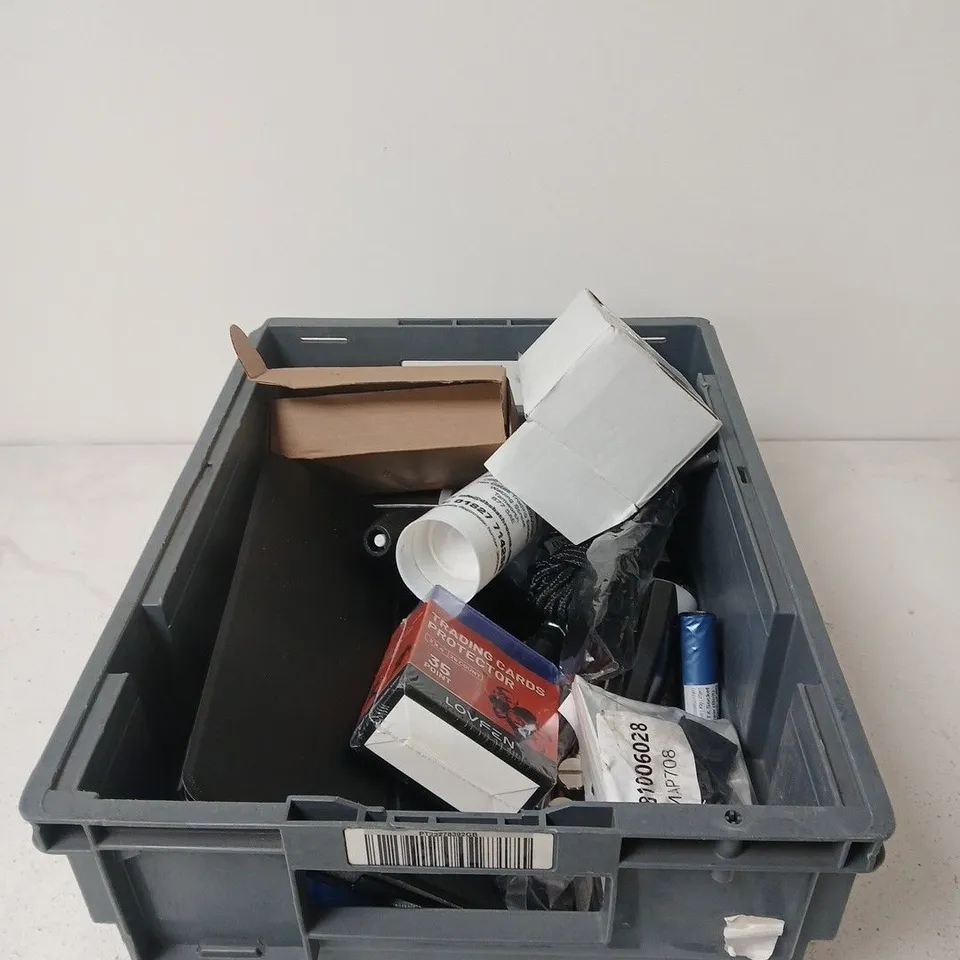 APPROXIMATELY 15  ASSORTED HOUSEHOLD ITEMS INCLUDING GENERAL PURPOSE ADHESIVE AND 4 PACK WHITE LIGHTS 