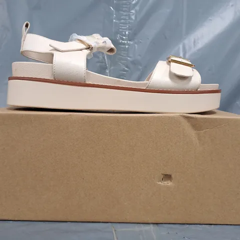 BOXED PAIR OF WHERE'S THAT FROM OPEN TOE PLATFORM SANDALS IN CREAM SIZE 5