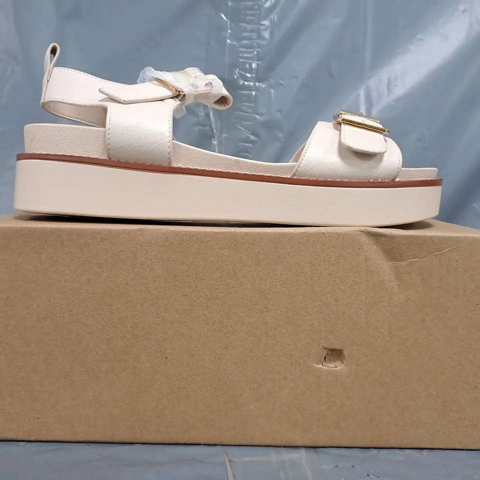 BOXED PAIR OF WHERE'S THAT FROM OPEN TOE PLATFORM SANDALS IN CREAM SIZE 5
