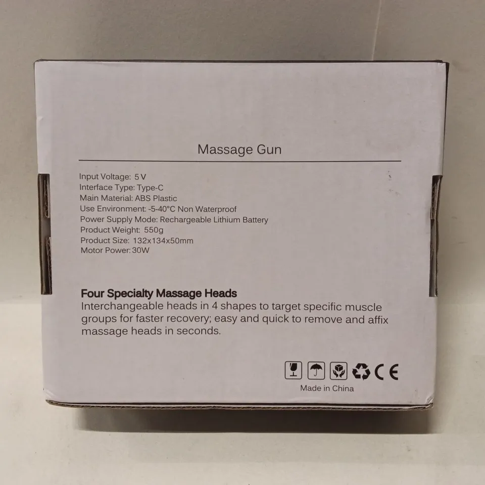 Massage Gun – Four massage heads