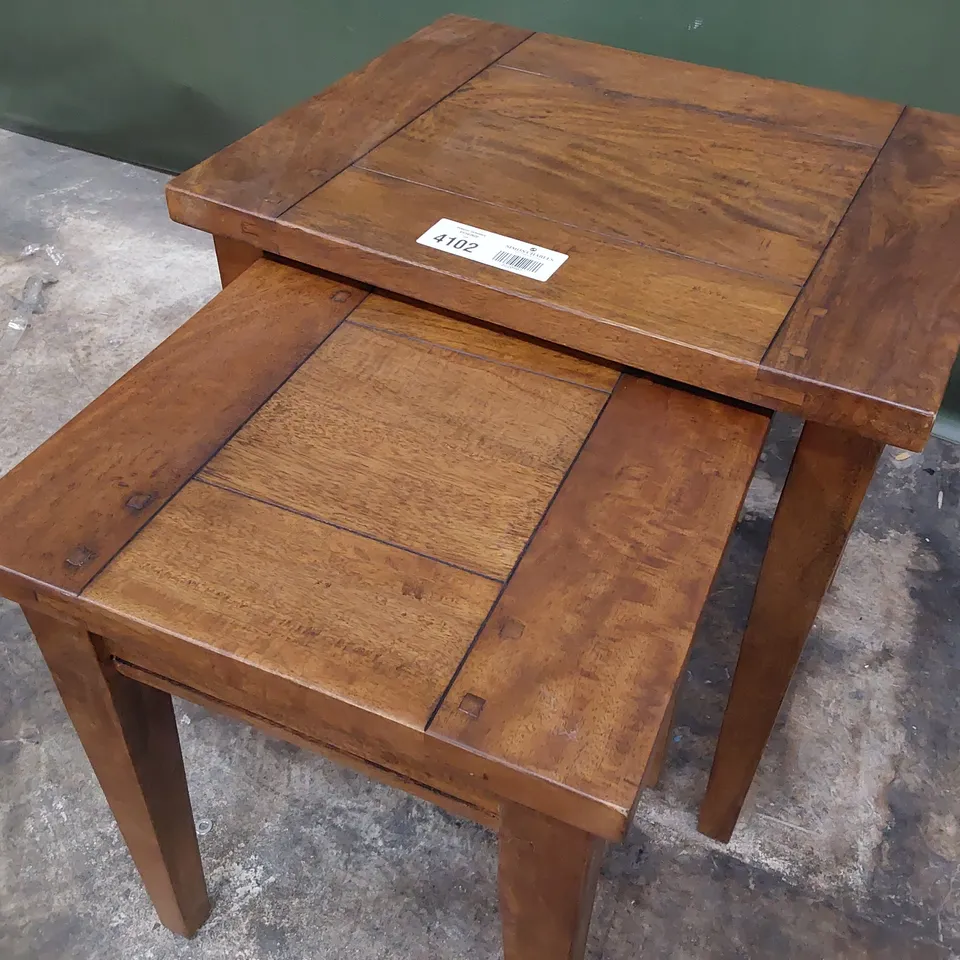 NEST OF TWO DESIGNER MANGO WOOD TABLES