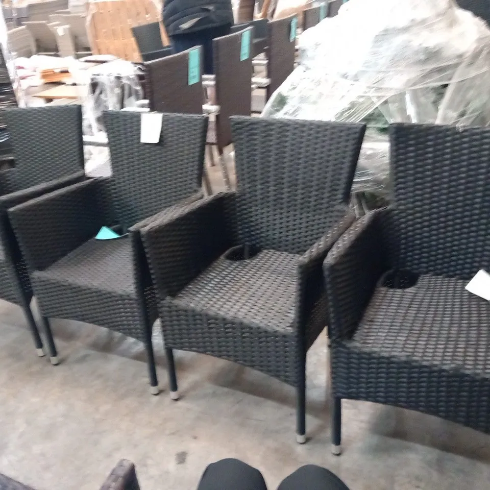 FOUR RATTAN EFFECT STACKING GARDEN CHAIRS