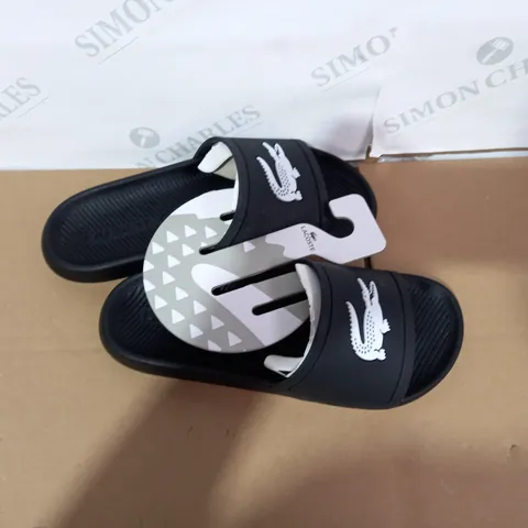 PAIR OF LACOSTE SLIDERS SIZE 7