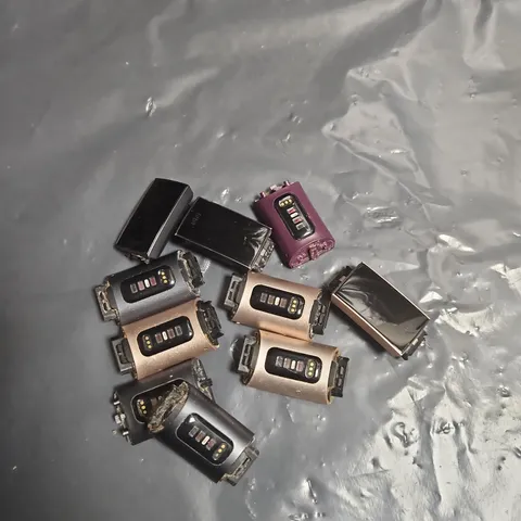 BAG OF APPROXIMATELY 10 FIT BIT CHARGE 3 WATCHES - VARIOUS COLOURS - NO STRAPS INCLUDED