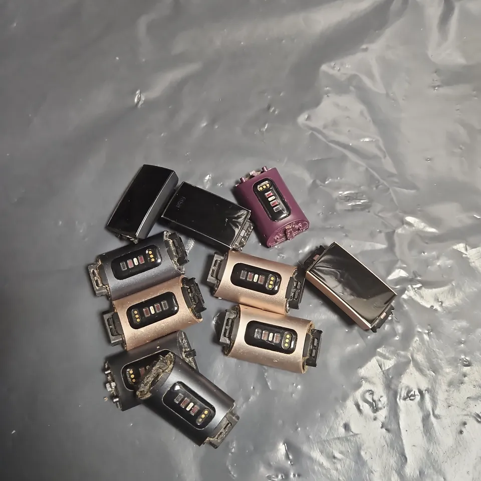 BAG OF APPROXIMATELY 10 FIT BIT CHARGE 3 WATCHES - VARIOUS COLOURS - NO STRAPS INCLUDED
