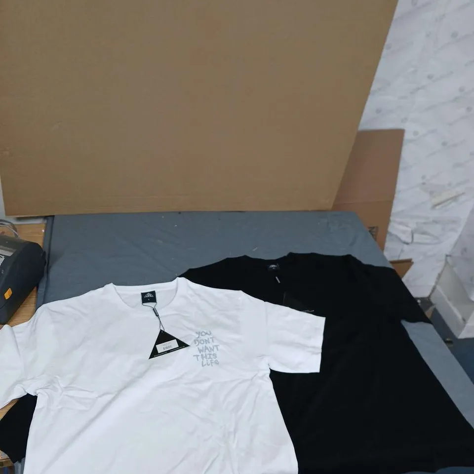 APPROXIMATELY 50 ITEMS OF 2  TYPES OF SHIRT BLACK AND WHITE WITH THE BRAND YOU DON'T WANT THIS LIFE IN VARIOUS SIZES .