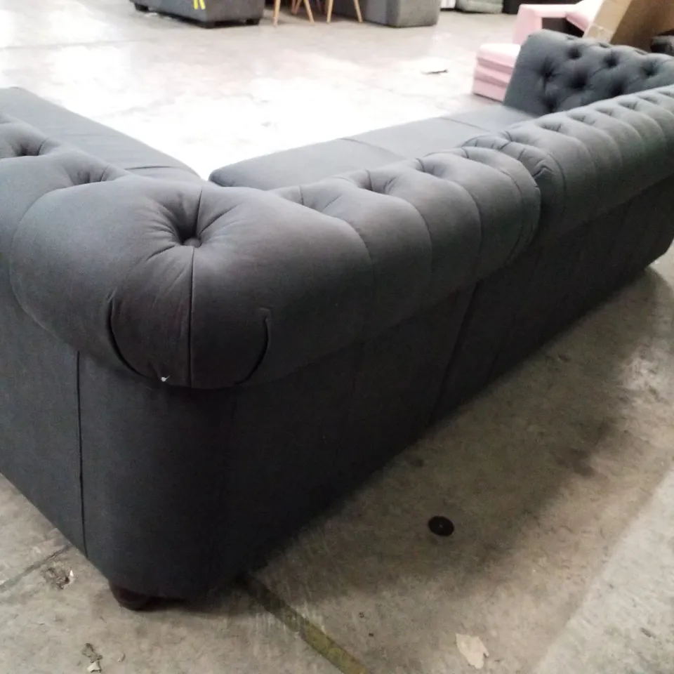 QUALITY DESIGNER 4 SEATER SOFA WITH RHF CHAISE - BLACK FABRIC 