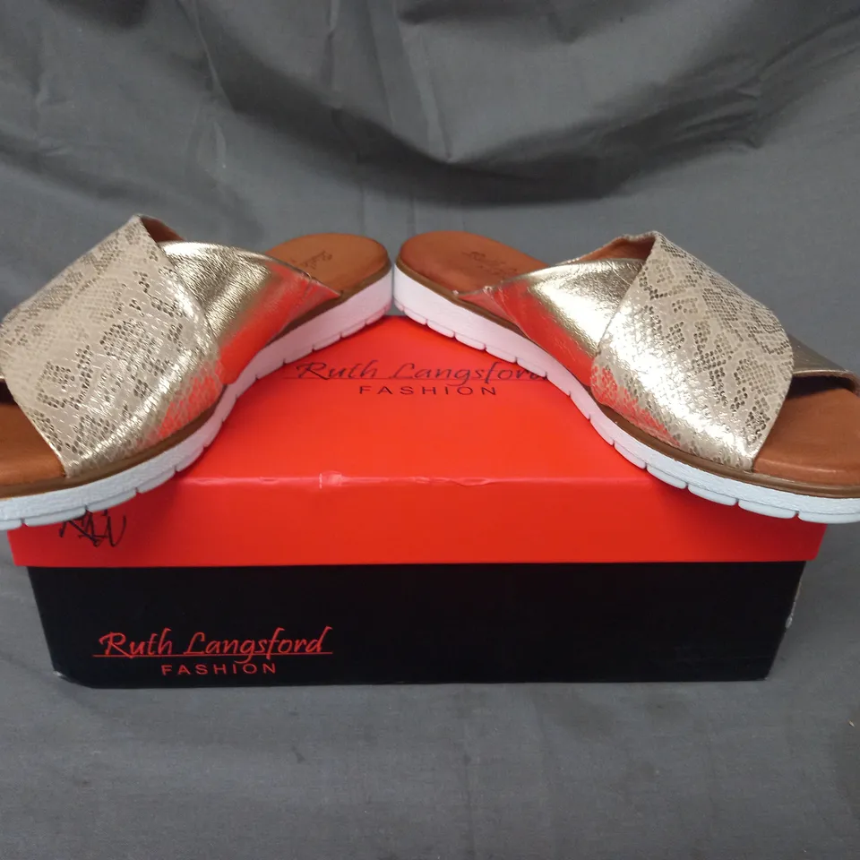 BOXED PAIR OF RUTH LANGSFORD FLAT SANDALS IN METALLIC CHAMPAGNE GOLD SIZE 6