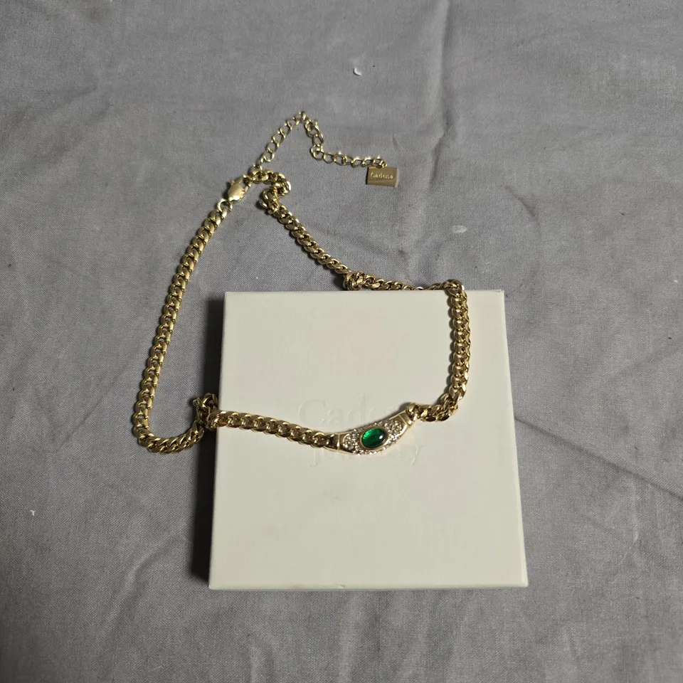  CADENA JEWELLERY GOLD-TONE BRACELET WITH EMERALD GREEN CENTRE STONE – BOXED