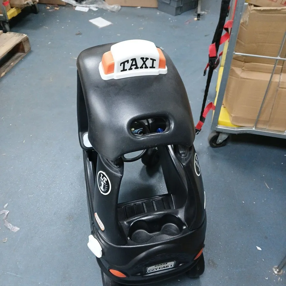 LITTLE TIKES TAXI RIDE-ON CAR – BLACK WITH TAXI SIGN NEEDS PARTIALLY ASSEMBLY