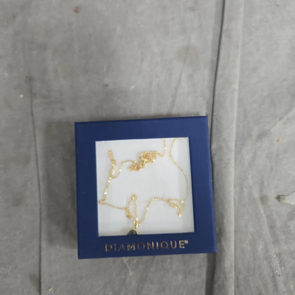 DIAMONIQUE GOLD TONE NECKLACE WITH BLUE PENDANT – BOXED