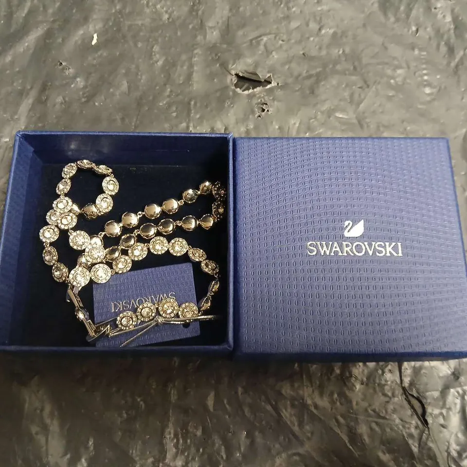 BOXED SWAROVSKI CRYSTAL DISC BRACELET 