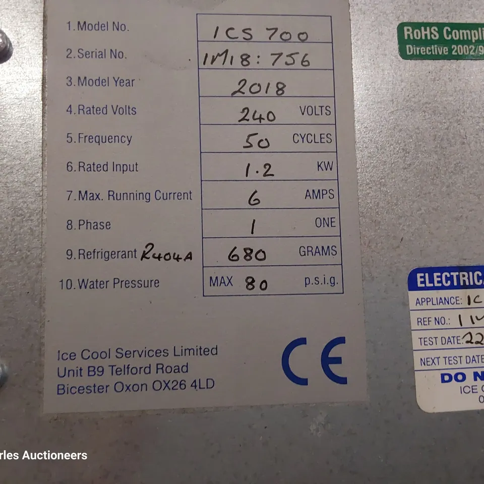 FOLLETT COMMERCIAL ICE MACHINE ON STAND WITH ICE TROLLEY