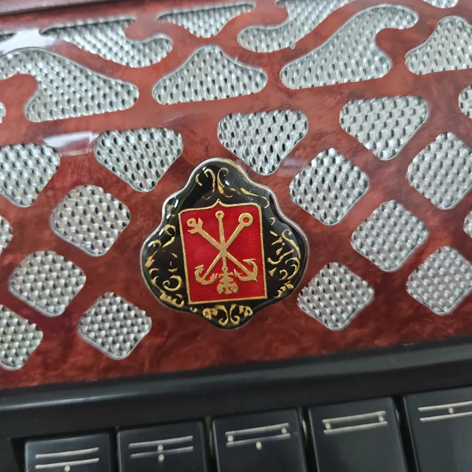 ANTIQUE RUSSIAN GARMON ACCORDION WITH RED MARBLED EXTERIOR AND STRAP – WITH HARD CASE MANUFACTURED IN LENINGRADKOYE 