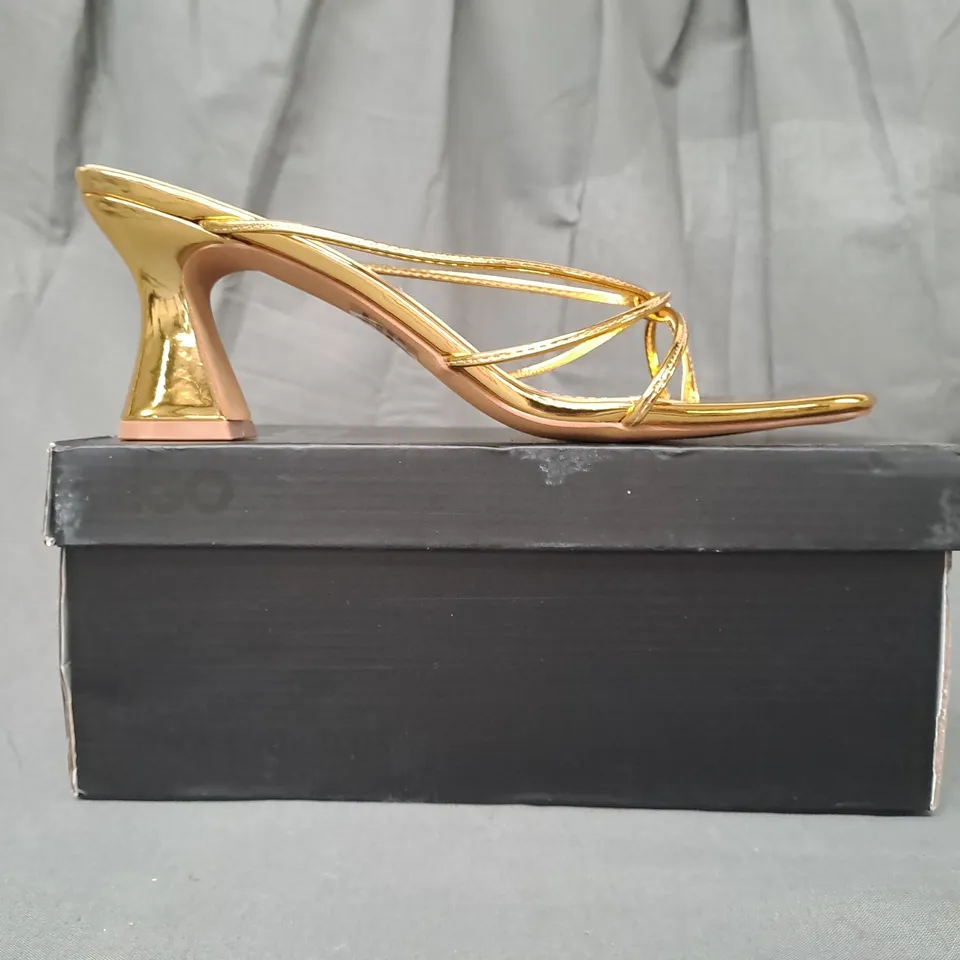 BOXED PAIR OF EGO TOE-POST HEELED SANDALS IN METALLIC GOLD UK SIZE 8