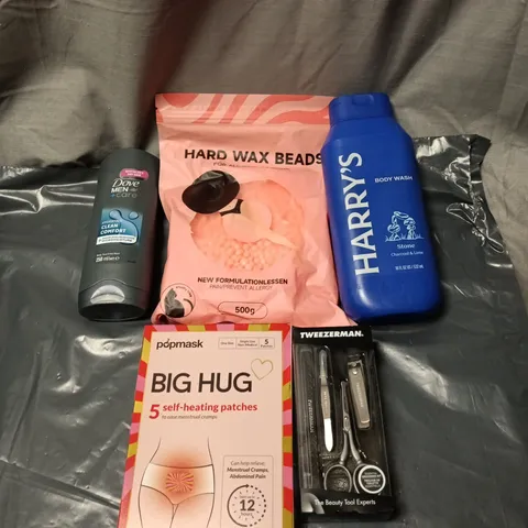 APPROXIMATELY 15 ASSORTED COSMETIC ITEMS INCLUDING HARRYS BODY WASH, GROOMING KIT, DOVE MEN SHOWER GEL, HARD WAX BEADS, BIG HUG SELF HEATING PATCHES