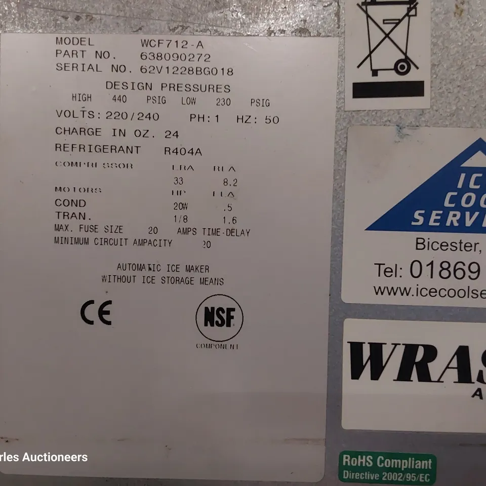 FOLLETT COMMERCIAL ICE MACHINE ON STAND WITH ICE TROLLEY