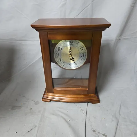 WOODEN MANTEL CLOCK WITH GLASS-FRONT DISPLAY AND BRASS DIAL
