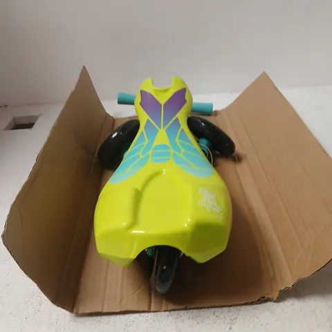 SCUTTLE BUG RIDE-ON TOY – YELLOW WITH TEAL HANDLES AND PURPLE/TEAL GRAPHICS 
