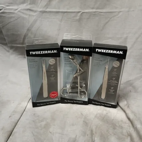 APPROXIMATELY 25 ASSORTED TWEEZERMAN PRODUCTS TO INCLUDE POINT TWEEZER, CLASSIC LASH CURLER, SLANT TWEEZER
